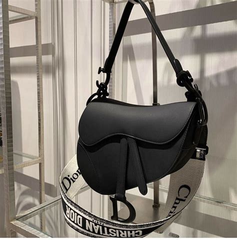 black saddle dior bag